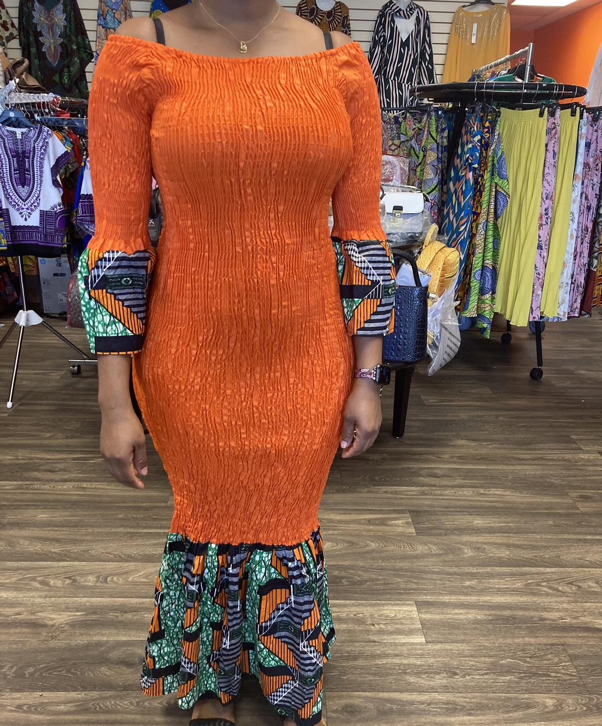 An African-print dress styled in the boutique