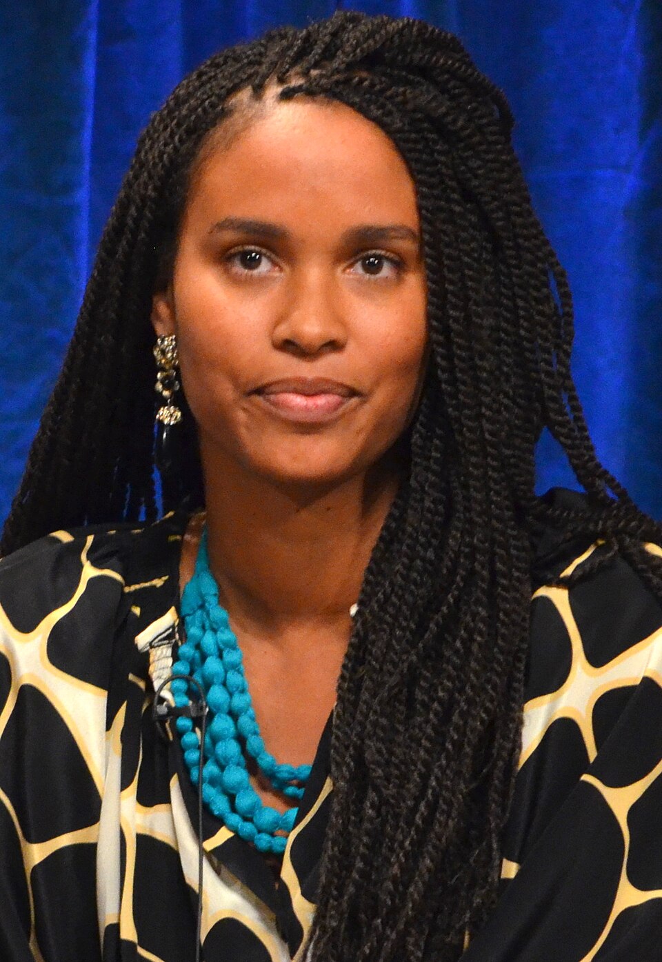 Woman with long box braids styled