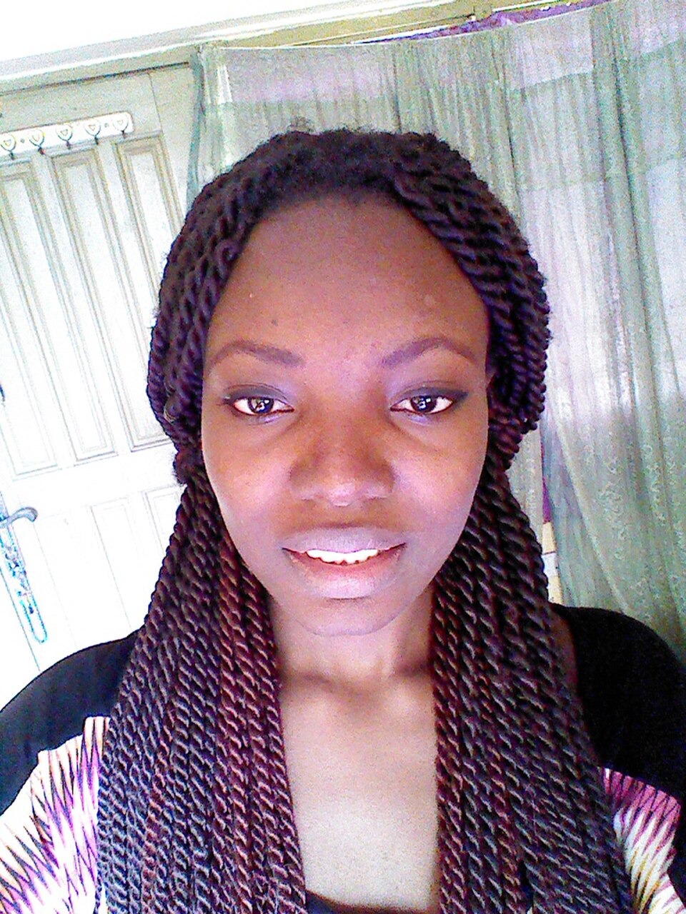 Black woman with long Senegalese twists